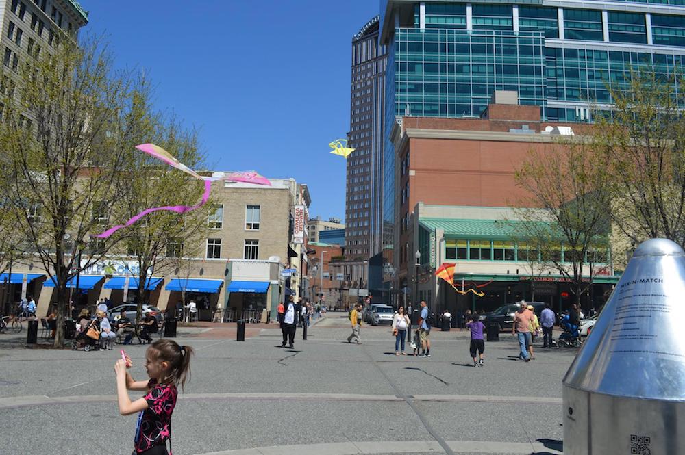 Kites fly over Market Square.